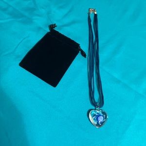 Beautiful hand painted heart necklace.